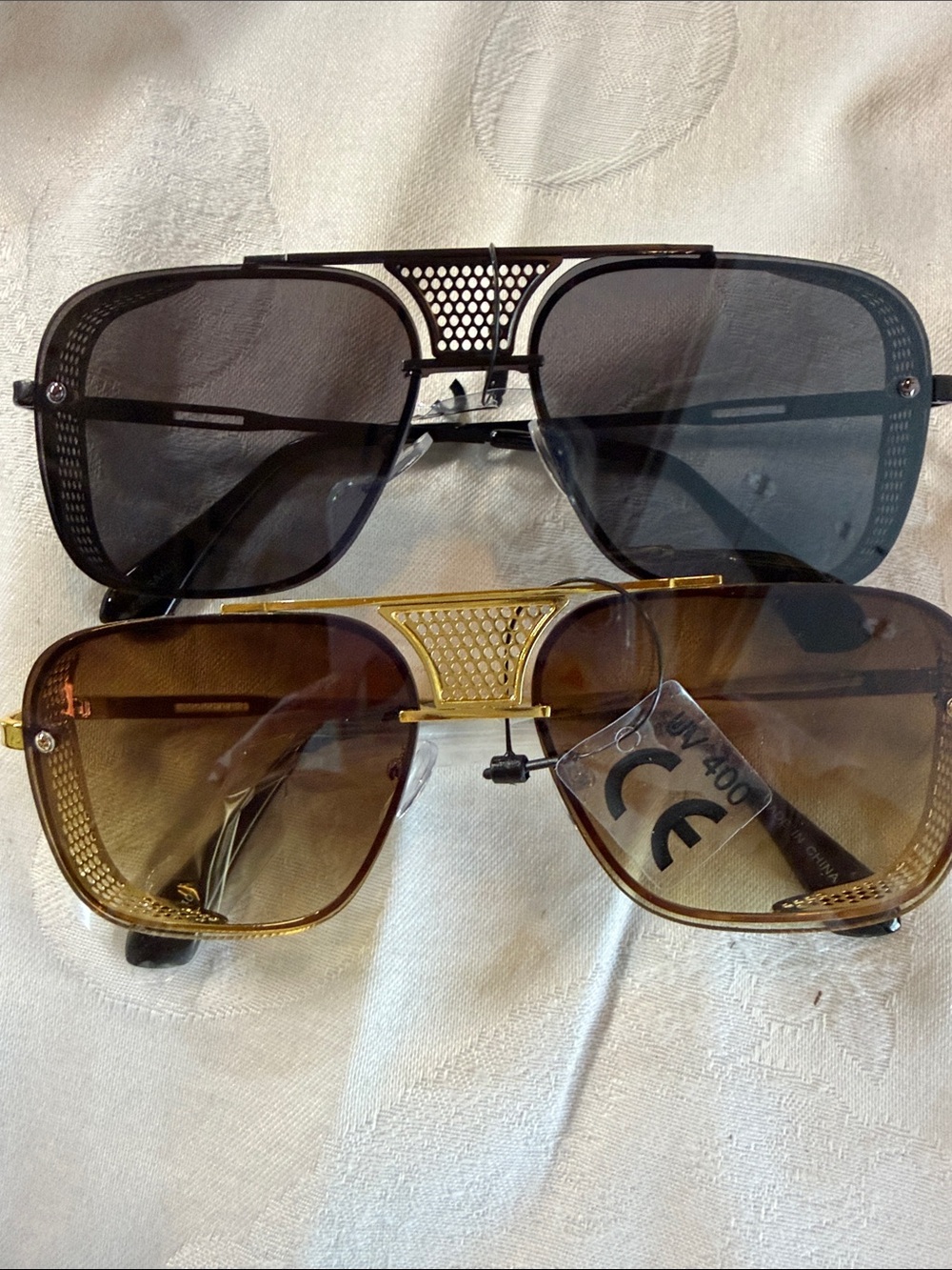Men’s new sunglasses 
2 pairs